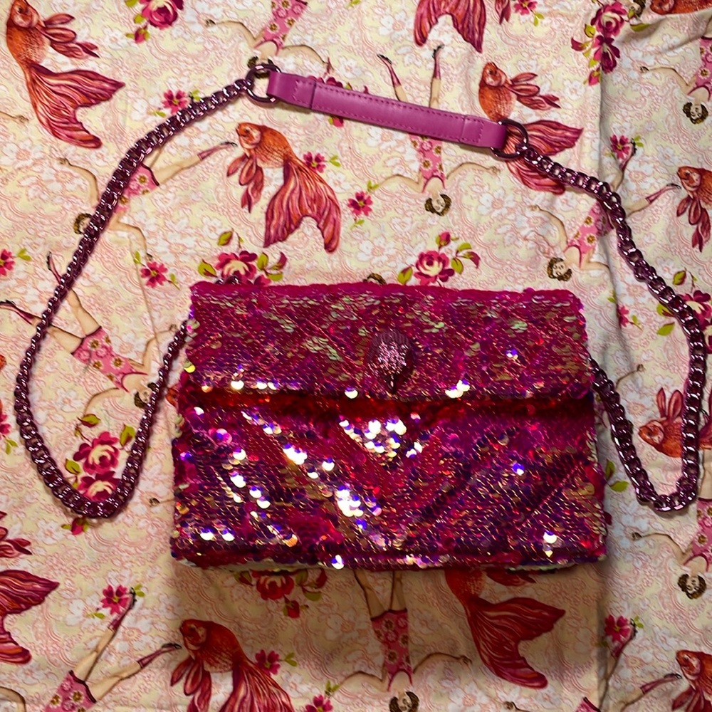 Kurt Geiger pink sequin shoulder bag with pink metallic chain.